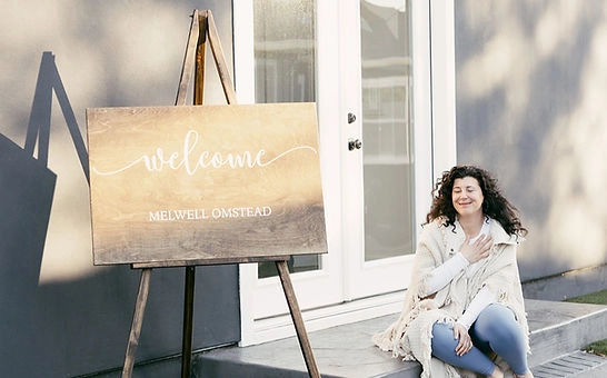 Mel teaching an advanced yoga session